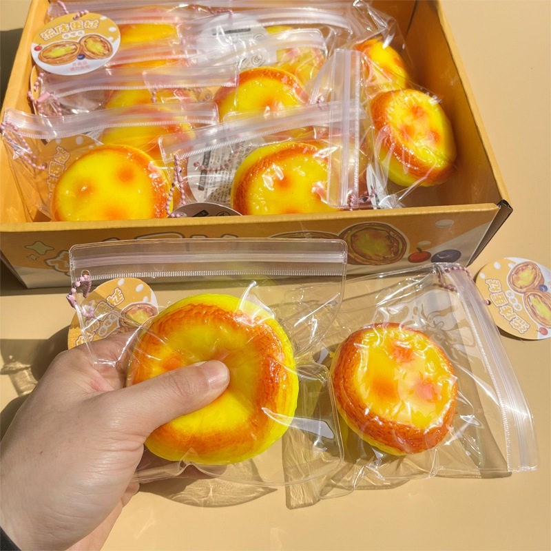 ของเล่นสกุชชี่ทาร์ตไข่จําลองของเล่นบีบคัสตาร์ดไหลเติมของเหลวพร้อมถุงพีวีซี