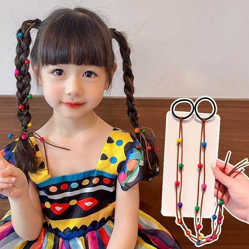 2 ชิ้นใหม่น่ารักชาติพันธุ์ที่มีสีสันลูกปัดสาววงผมยืดหยุ่นเด็กอุปกรณ์ผม