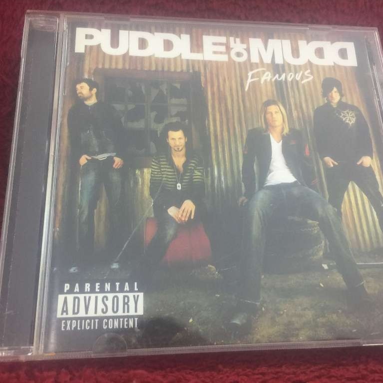 CD Puddle Of Mudd – Famous สภาพตามรูปปก ZA297-68