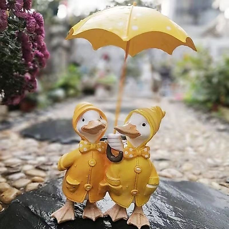 ตุ๊กตาเรซินรูปเป็ดถือร่ม สำหรับสวนและห้องนั่งเล่น สไตล์การ์ตูน