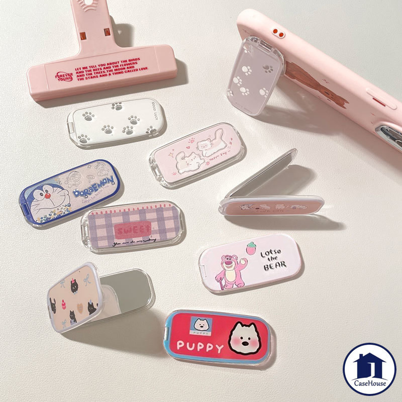ขาตั้งโทรศัพท์กระจกแต่งหน้าพับได้แบบสร้างสรรค์ทันสมัย ​​เคสโทรศัพท์อเนกประสงค์ ลายการ์ตูนโดราเอมอน คิตตี้ ที่วางโทรศัพท์