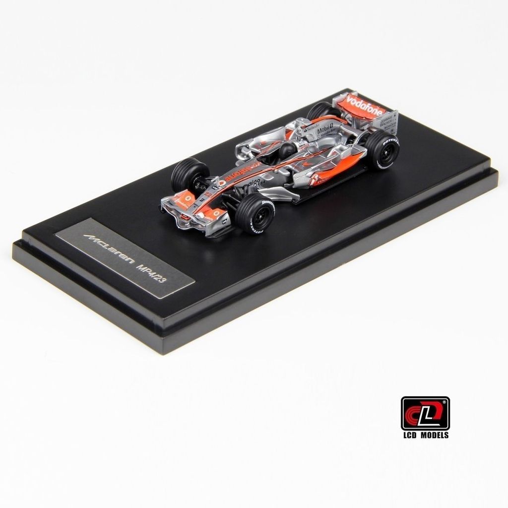 LCD 1/64 McLaren MP4-23 F1 โลหะผสมรถDiecastรุ่นของเล่นของขวัญวันเกิด