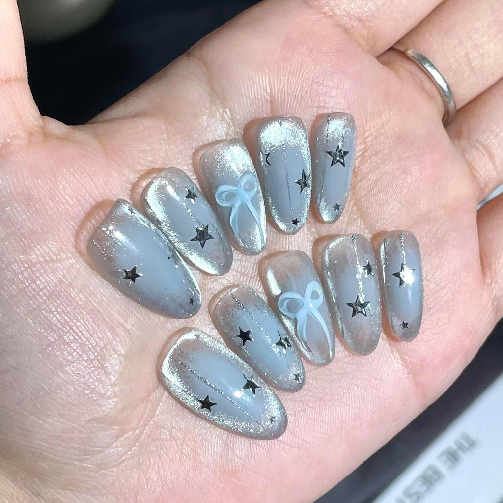 A456  10 ชิ้นต่อชุด เล็บปลอมสำเร็จรูปงานมือ ลายฟุ้งเกาหลี ติดดาวและโบว์ โทนสีน้ำเงินเรียบหรูดูแพงสไตล์พรีเมียม