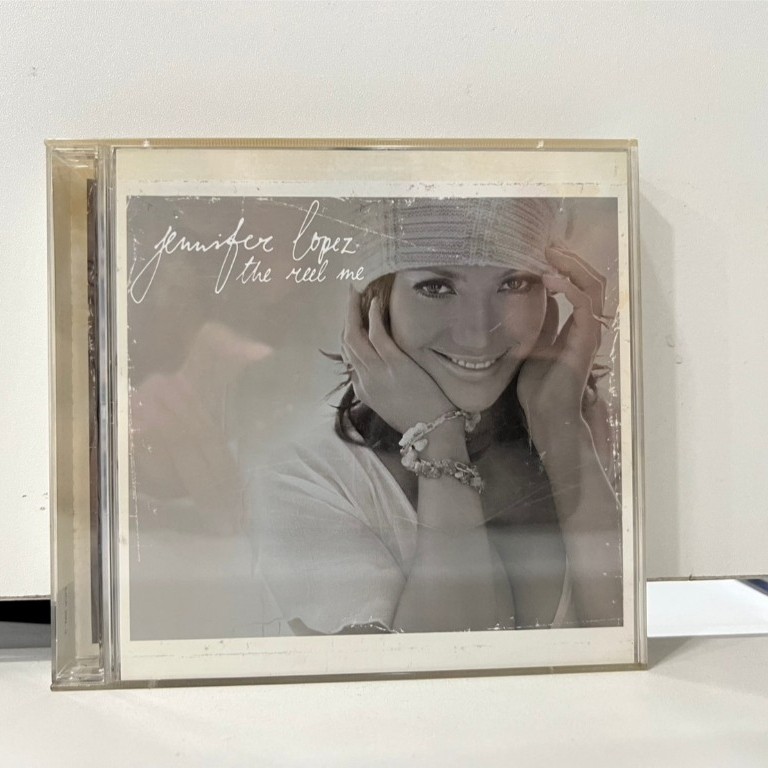1 CD + 1 DVD MUSIC ซีดีเพลงสากล JENNIFER LOPEZ THE REEL ME (B13F44)