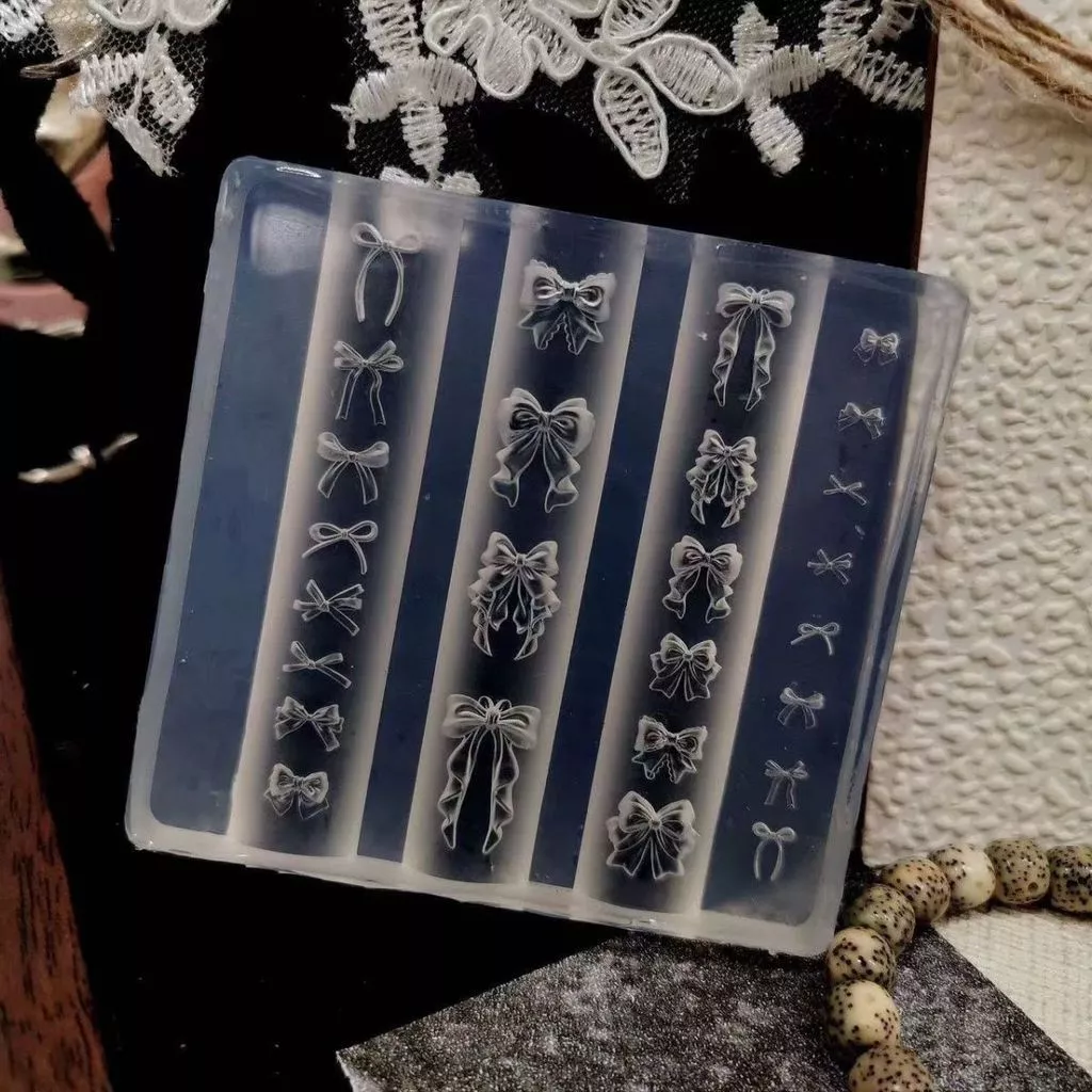 สไตล์ใหม่ครีมโบว์แม่พิมพ์แต่งเล็บซิลิโคนเครื่องประดับเล็บสามมิติสวมใส่เล็บแต่งร้านเครื่องมือ