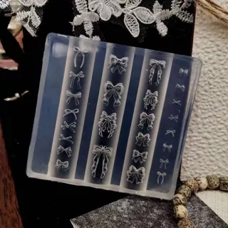 สไตล์ใหม่ครีมโบว์แม่พิมพ์แต่งเล็บซิลิโคนเครื่องประดับเล็บสามมิติสวมใส่เล็บแต่งร้านเครื่องมือ