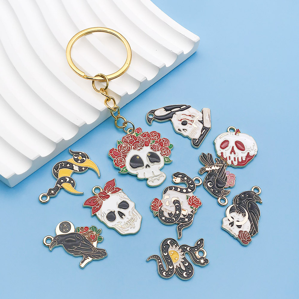 น้ํามันหยดฮาโลวีนการ์ตูน Crow Snake Climbing Moon Skull จี้ดอกไม้ diy เครื่องประดับสร้อยข้อมือสร้อยค