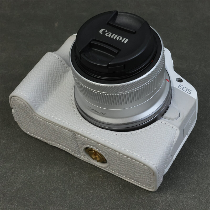 เหมาะสําหรับกระเป๋ากล้อง Canon eos r50 r100 เคสหนังป้องกัน r50 ครึ่งชุดฐาน r100 Shell