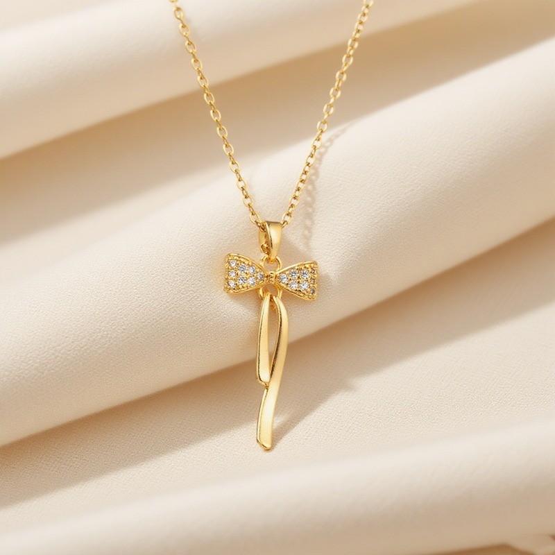เวอร์ชั่นเกาหลีชุบเรียบง่าย 18K Gold พู่สร้อยคอโบว์หญิง Niche หรูหราไทเทเนียมเหล็ก Clavicle Chain เครื่องประดับ