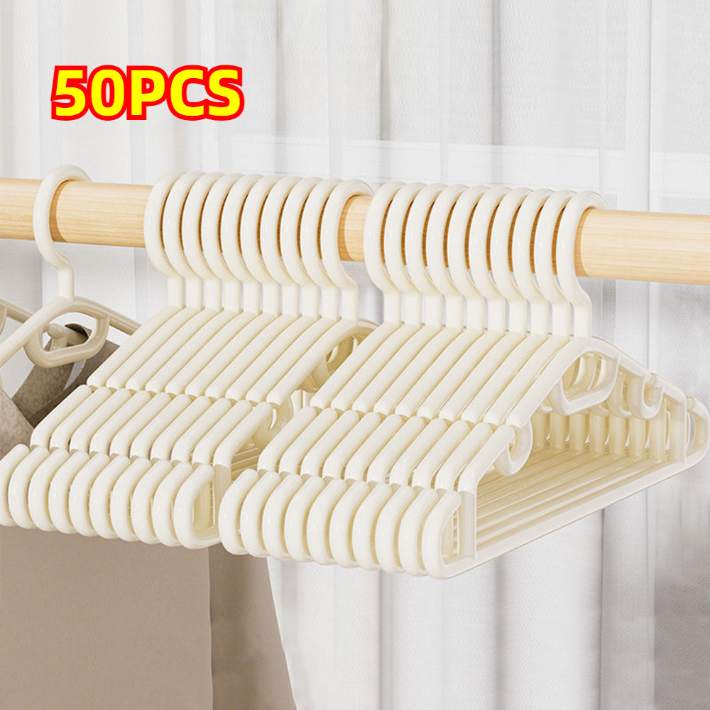 50pcs ไม้แขวนเสื้อพลาสติกกันลื่นสีขาว เหมาะสำหรับจัดระเบียบตู้เสื้อผ้า ไม้แขวนเสื้อพลาสติกบาง ไม้แขวนเสื้อ