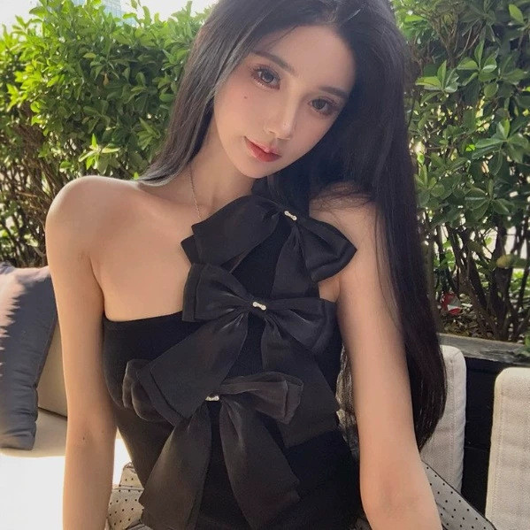 TZ6558法式纯欲辣妹斜肩蝴蝶结背心女小心机设计感别致绝美小上衣TZ6558 French pure desire hot girl oblique shoulder butterfly202605
