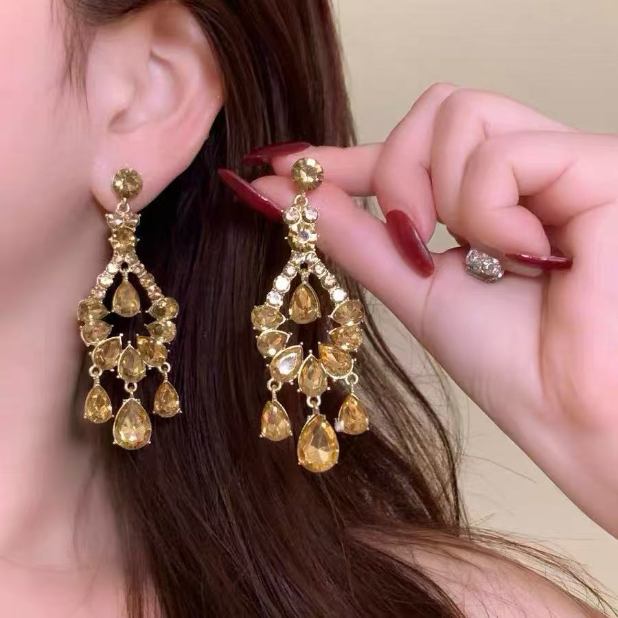 แชมเปญ Hollow Water Drop ต่างหูพู่หรูหรา High-End บุคลิกภาพ Prism ต่างหู