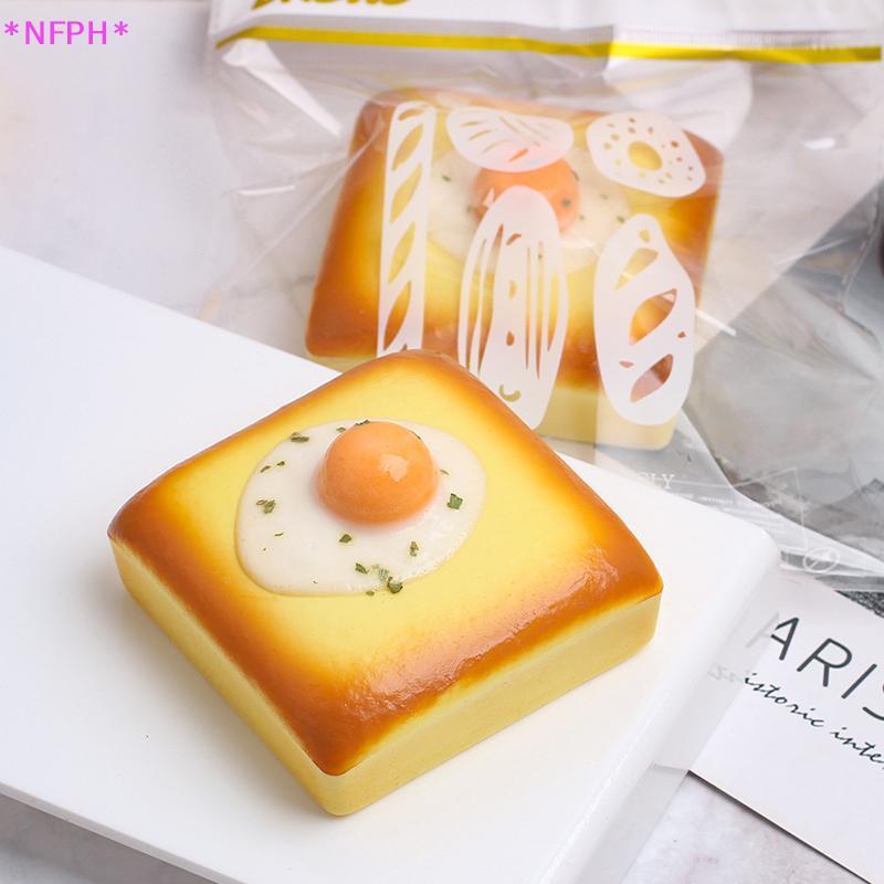 NFPH> สกุชชี่ ขนมปังไข่ดาว ของเล่นคลายเครียด เพิ่มขึ้นช้า สนุกสําหรับทุกวัยใหม่