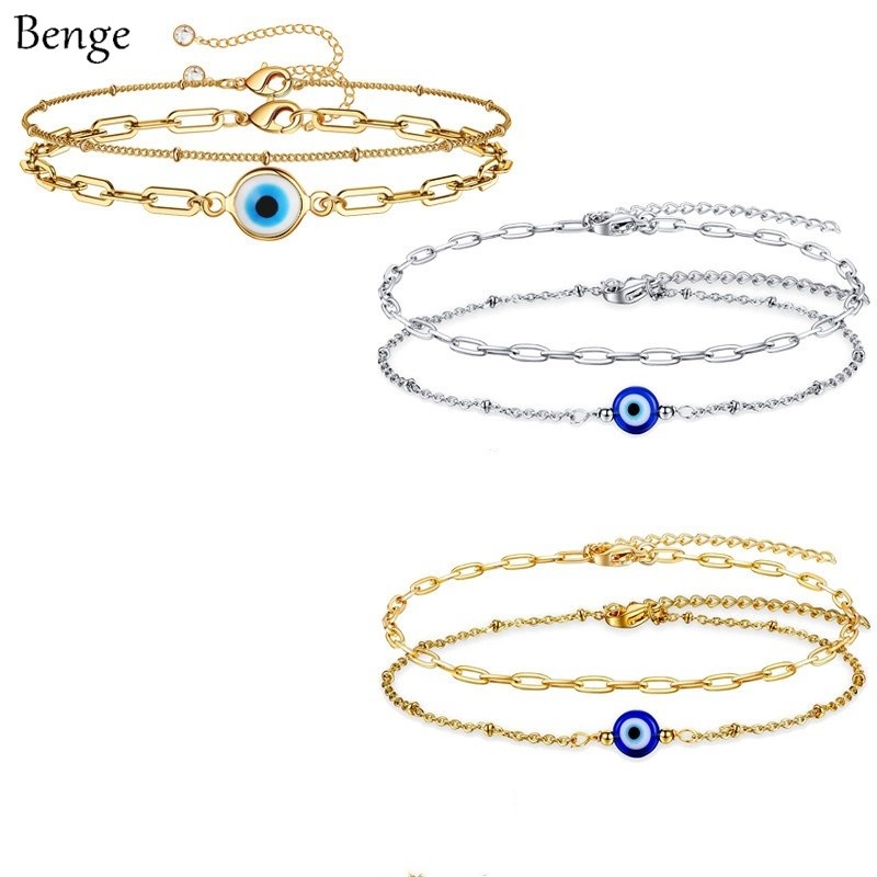 สร้อยข้อมือสแตนเลสสองชั้น ออกแบบมาพร้อม Evil Eye charm ขนาดเล็ก ไม่อันตรายต่อผิว เหมาะสำหรับสวมใส่ทุกวันและเป็นของขวัญให้คนพิเศษ