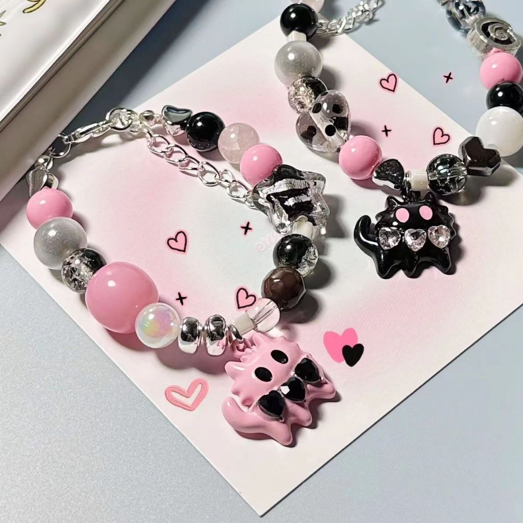 [พร้อมส่ง] สร้อยข้อมือลูกปัดคู่หูบัดดี้ ลายเหมียวปิศาจตาโตชมพู-ดำ กำไลข้อมือแฟชั่นเกาหลีน่ารัก ลูกปัดพาสเทล