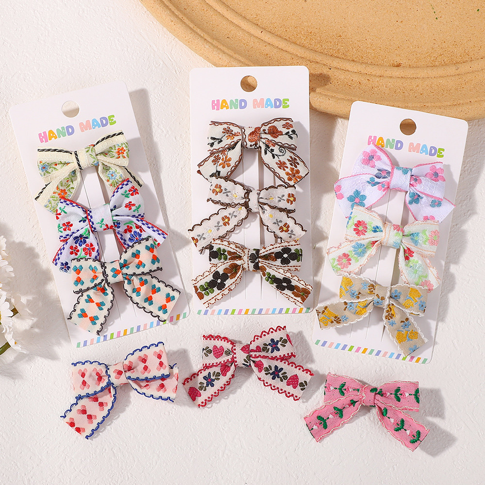 เซ็ตรัดผมBowknotและBarrettesลายดอกไม้สำหรับสาวๆ พร้อมคลิปผม3ชิ้น