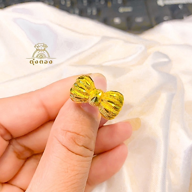 แหวนหุ้มทอง ลายโบว์ใหญ่ ลายขายดี สีสุกเหมือนทองจริง หนัก 2 สลึง