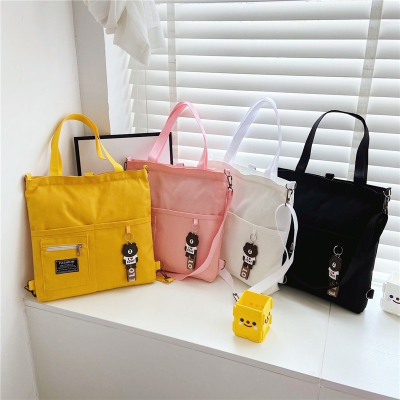 KVK-shop: กระเป๋าผ้าแคนวาสมีซิปด้วยใส่ของได้เยอะนะผ้าแข็งแรง-มีพวงกุญแจแถมให้ KS029