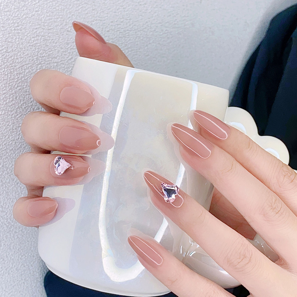 เล็บแบบกดยาวพิเศษสําหรับผู้หญิงรูปไข่สีอ่อนโยนเล็บเทียมแบบใช้ซ้ําได้สําหรับร้านเสริมสวยและผู้หญิง Na