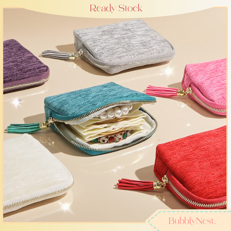 กระเป๋าจัดระเบียบเครื่องประดับห้าชั้นแบบพกพาพร้อมปอมปอมและซิป สำหรับแหวน กำไล ต่างหู สร้อยคอ เครื่องประดับ กระเป๋าแฟชั่นสไตล์ทันสมัย