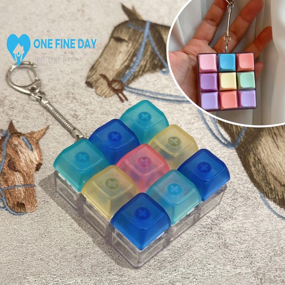 คีย์บอร์ดนิ้ว 9 คีย์ปุ่ม Fidget พวงกุญแจ Gadget Pass Time Decompression บรรเทา W3z1