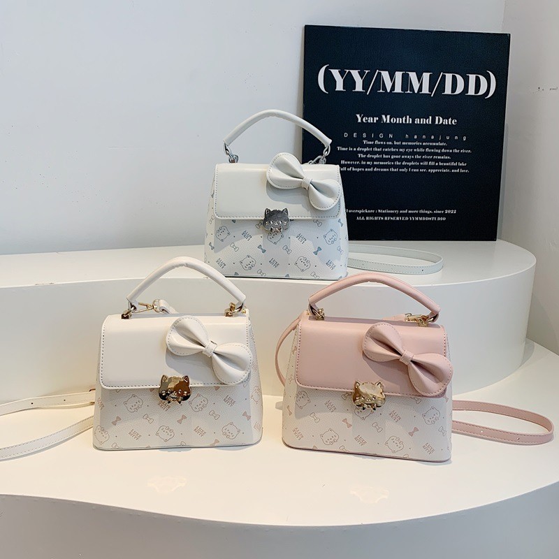 LUXE & KITTY หรูหราเวอร์ชั่นเกาหลีแฟชั่นกระเป๋าเครื่องสําอางไหล่เดียวโบว์น่ารักแบบพกพาข้ามร่างกายหวา