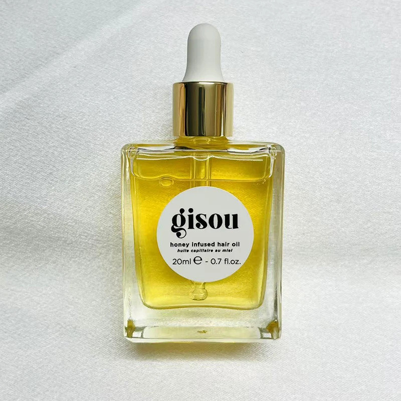 Gisou Honey Infused Lip Hair Oil ขนาดเดินทางอุดมไปด้วย Mirsalehi Honey เพื่อบํารุงและให้ความชุ่มชื้น