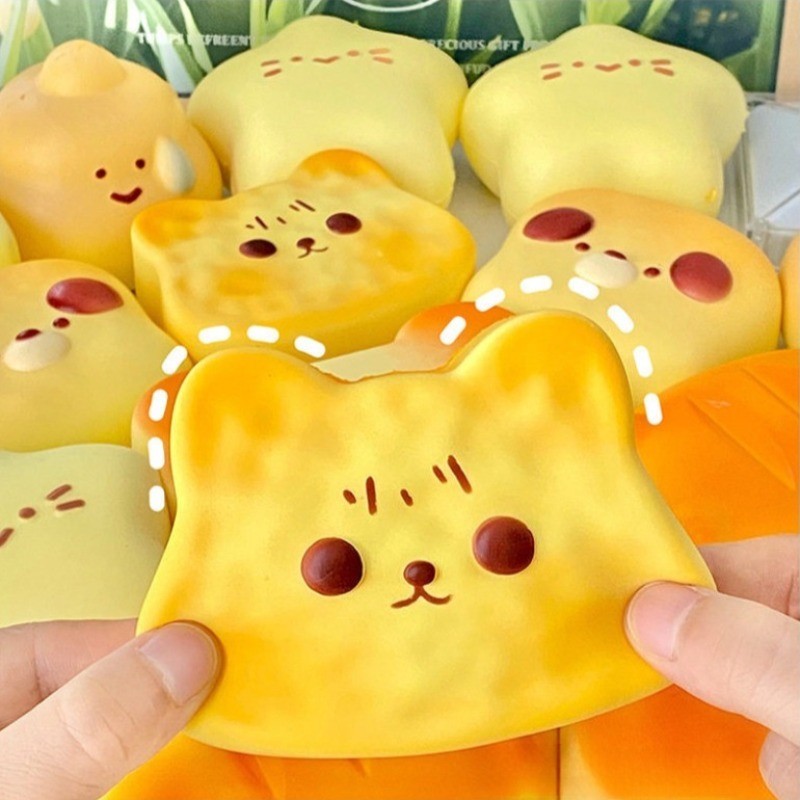 สกุชชี่สุนัขน่ารัก ช้า เพิ่มขึ้น บีบความเครียดบรรเทารายการนุ่มครีมเนื้อกดความดันปล่อยมือผ่อนคลายช่วยสก์ท็อปเครื่องปร