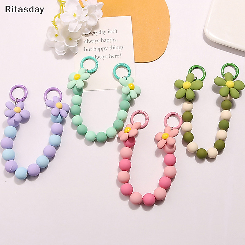 Ritasday Ins สร้อยข้อมือลูกปัดที่มีสีสันจี้ดอกไม้โซ่โทรศัพท์ที่วางโทรศัพท์กรณีโซ่ดอกไม้ Anti-Lost CHAIN เครื่องประดับใหม่