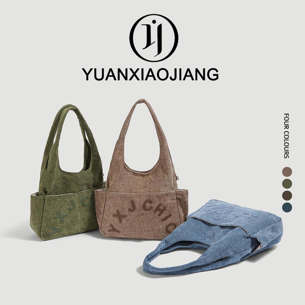YUANXIAOJIANG กระเป๋าสะพายไหล่ผู้หญิงวินเทจสไตล์ญี่ปุ่นมินิมอลแมทช์ง่ายมี4สีพร้อมส่ง
