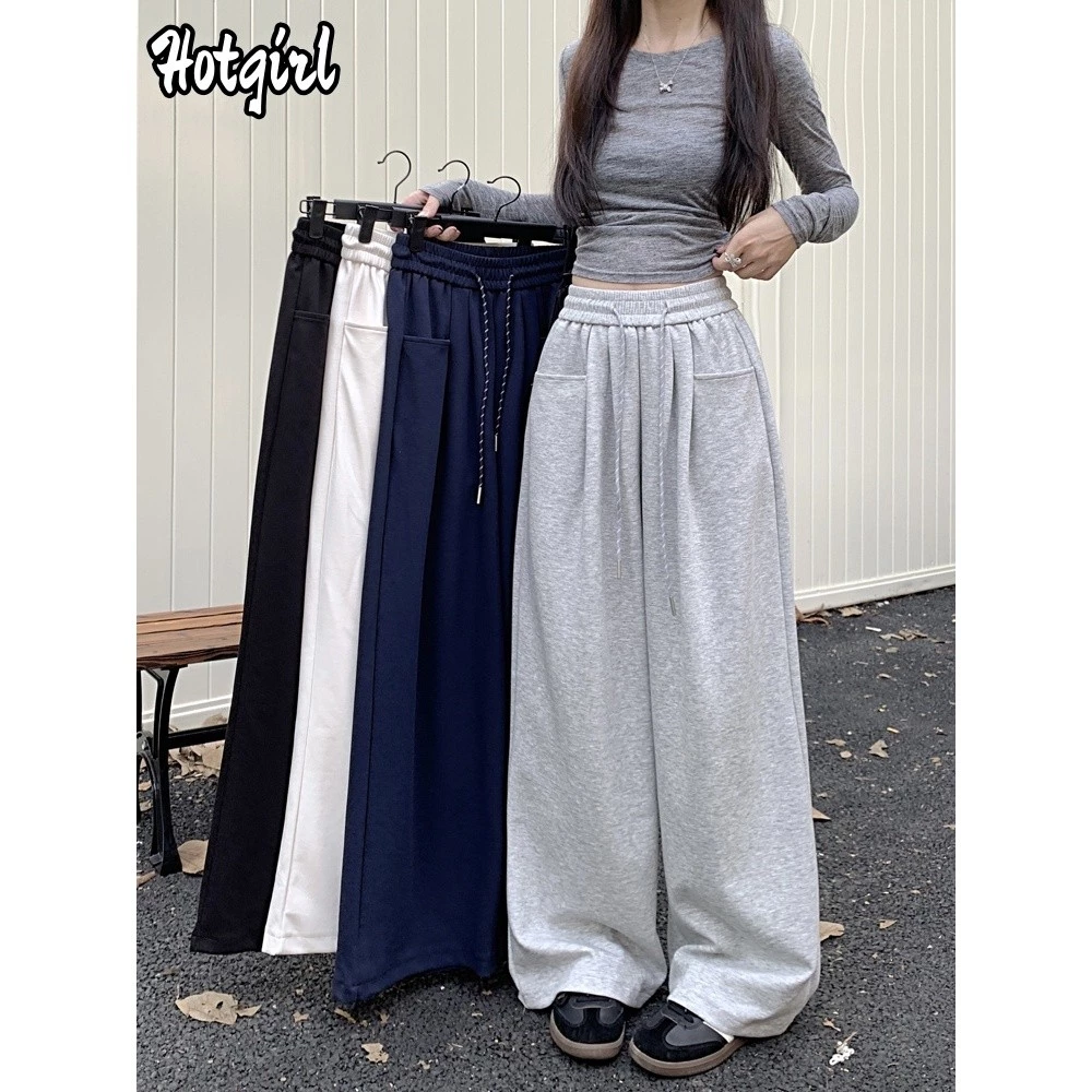 Hotgirl พร้อมส่ง กางเกงวอร์มผู้หญิง กางเกงขายาว ใส่แล้วดูผอม รุ่นสูง ขากว้างทรงตรง สีพื้น ดีไซน์เชือกรูด