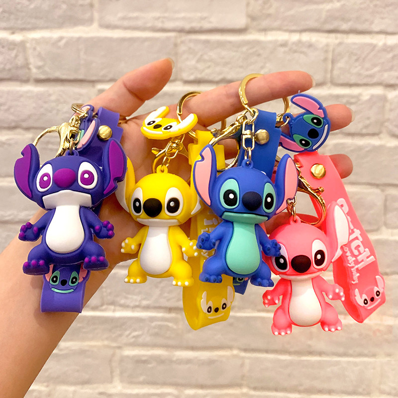 Stitch ของเล่นพวงกุญแจอะนิเมะรูป Stitch จี้พวงกุญแจหวานสีชมพู Angel พวงกุญแจผู้หญิงพวงกุญแจรถสาว