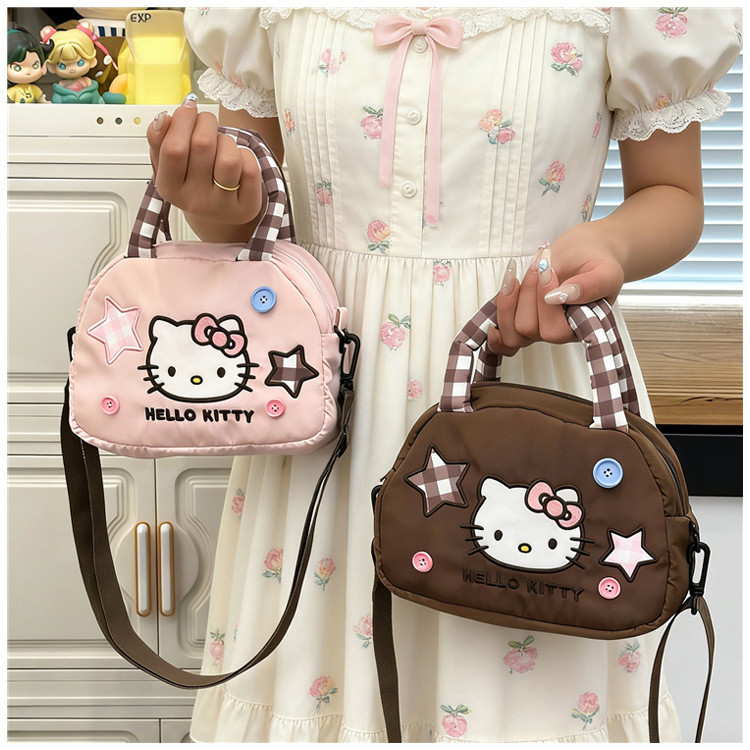 Hello Kitty น่ารักน้ําหนักเบากระเป๋าถือสาวเกาหลีรุ่นสไตล์ใหม่ลงผ้าฝ้ายเมฆกระเป๋าไหล่ ผู้สื่อสาร กระเป๋า