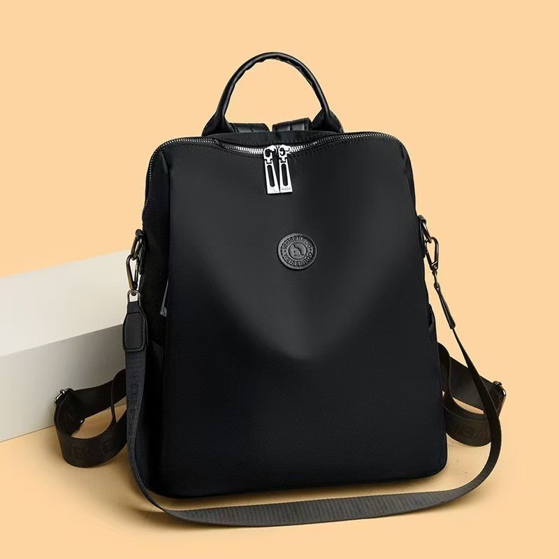 กระเป๋าเป้สะพายหลังผ้า Oxford มัลติฟังก์ชั่นใหม่ Simple Commuting ความจุขนาดใหญ่กระเป๋าเป้สะพายหลังผู้หญิง Casual Travel กระเป๋านักเรียน