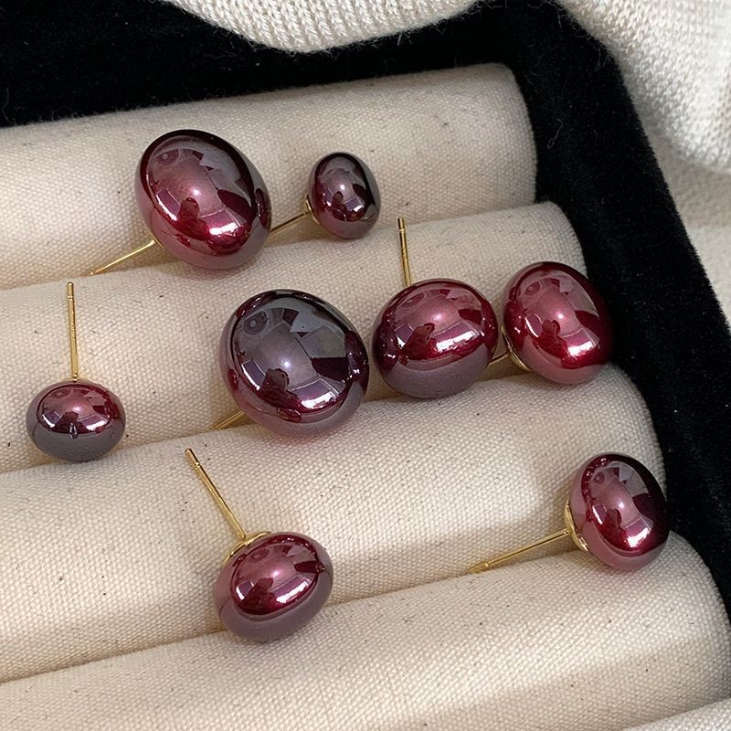 ไวน์สีแดงแบนรอบนึ่งบุญมุกต่างหูหญิงสีม่วงต่างหูมุก เซี่ยหง