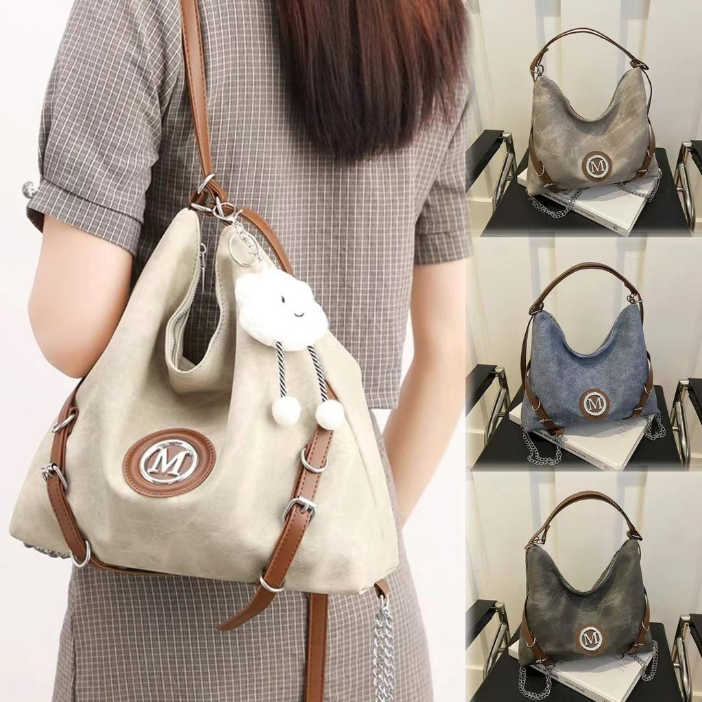 KVK-shop: กระเป๋าใบใหญ่สะพายข้างมีซิปด้วยมาใหม่ โบว์น่ารัก สามารถปรับเป็นกระเป๋าเป้ได้ - SP3117
