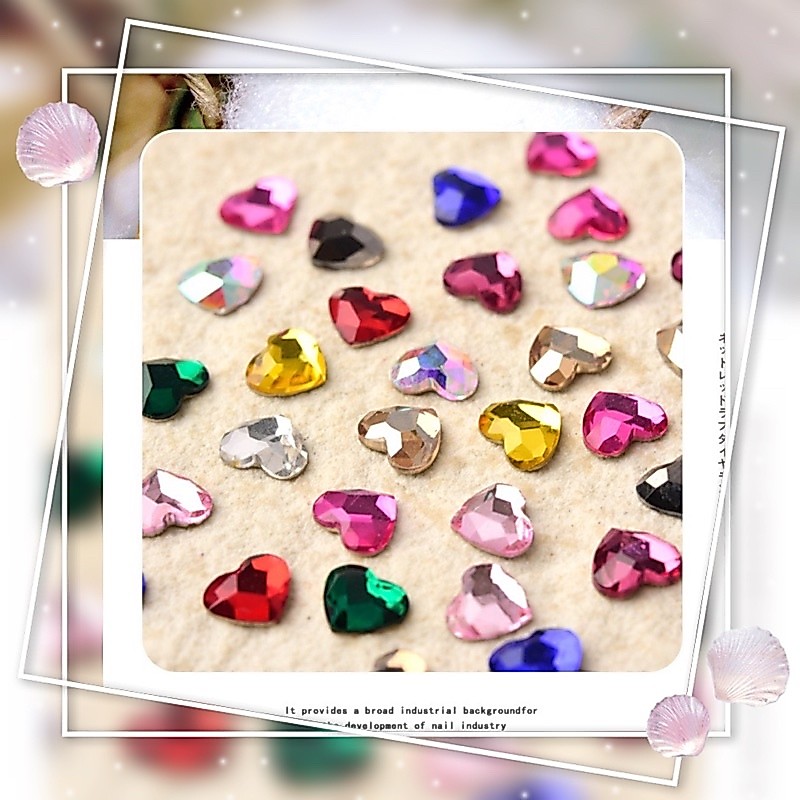 อะไหล่ติดเล็บหัวใจเพชรหลากสี ( แพค50ชิ้นคละสี )ขนาด 5x6mm.งานจริงวิ้งจุงเบย พร้อมส่งมาก