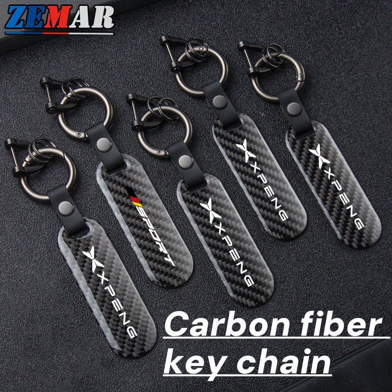 Xpeng X9 G6 พวงกุญแจรถคาร์บอนไฟเบอร์ Hang Tag หัวเข็มขัดกุญแจรถจักรยานยนต์ High-end แขวนพวงกุญแจสําห