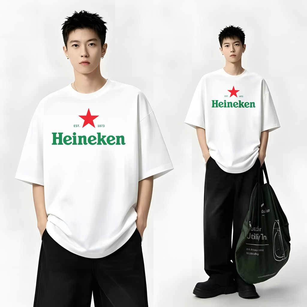 เสื้อยืดผู้ใหญ่ แขนสั้น คอกลม | ผ้าฝ้ายแท้ 100% | ทรงหลวมโอเวอร์ไซซ์ | ลายพิมพ์โลโก้ดาว Heineken | ใส่สบาย |