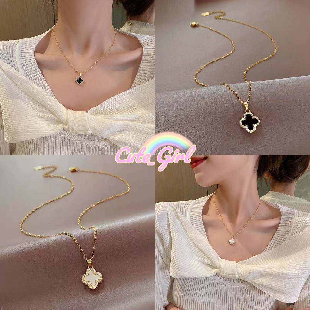 Cute_Girl 🍀🍀 สร้อยคอแฟชั่น สีดำและสีขาว จี้รูปใบโคลเวอร์สี่แฉกสองด้าน ราคาที่เอื้อมถึง มีสไตล์และเรียบง่าย ส่งไวจากไทย