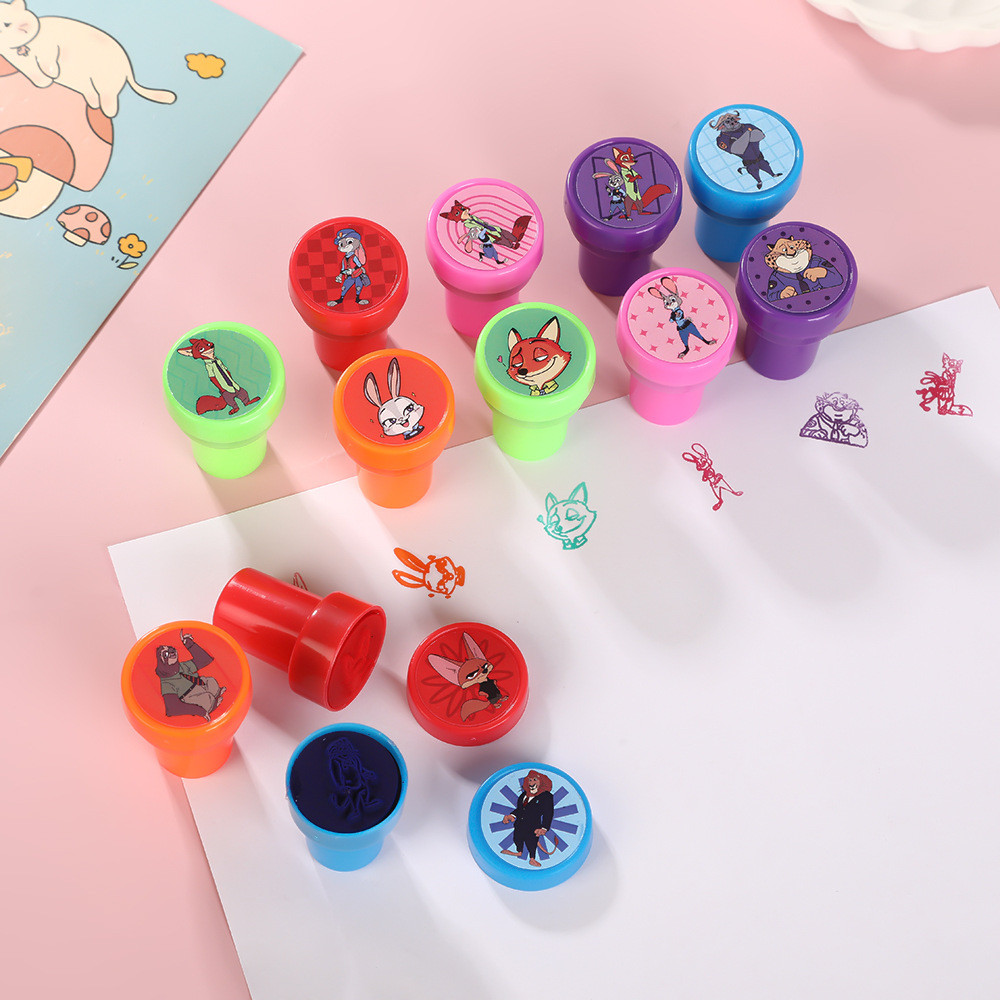 12pcs Zootopia แสตมป์ Party Favors Judy กระต่ายตราประทับสําหรับเด็กห้องเรียนรางวัลโรงเรียน Goodie กระเป๋าของขวัญวันเกิด Party