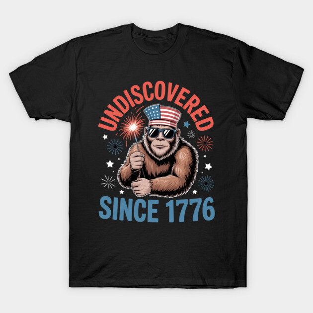 เสื้อยืด Vintage Undiscovered since 1776 funny Sasquatch 4th of July big foot T-Shirt แท้ Cotton