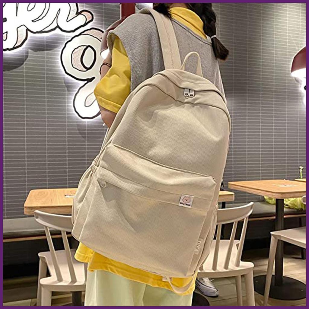 Casual Daypack กระเป๋าเป้สะพายหลังสีทึบกระเป๋านักเรียนแฟชั่นน้ําหนักเบา Rucksack Daypack สําหรับสาวว