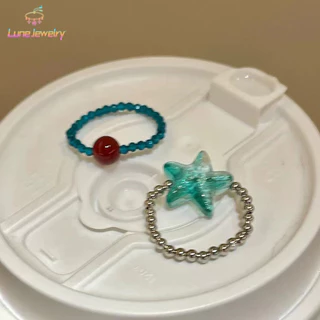 COD💖แหวนลูกปัดรูปปลาดาวสีเขียวสำหรับผู้หญิง แหวนนิ้วชี้แบบปรับแต่งได้ แหวนปรับได้อเนกประสงค์-Lune
