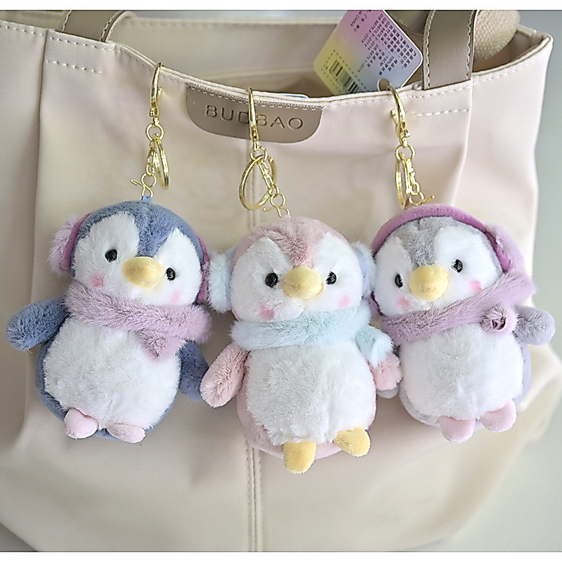 เพนกวินน้อยของเล่นตุ๊กตากับหูฟังพวงกุญแจจี้กระเป๋าเครื่องประดับกลิ่นน่ารักน่ารักกรงเล็บเครื่องตุ๊กตา