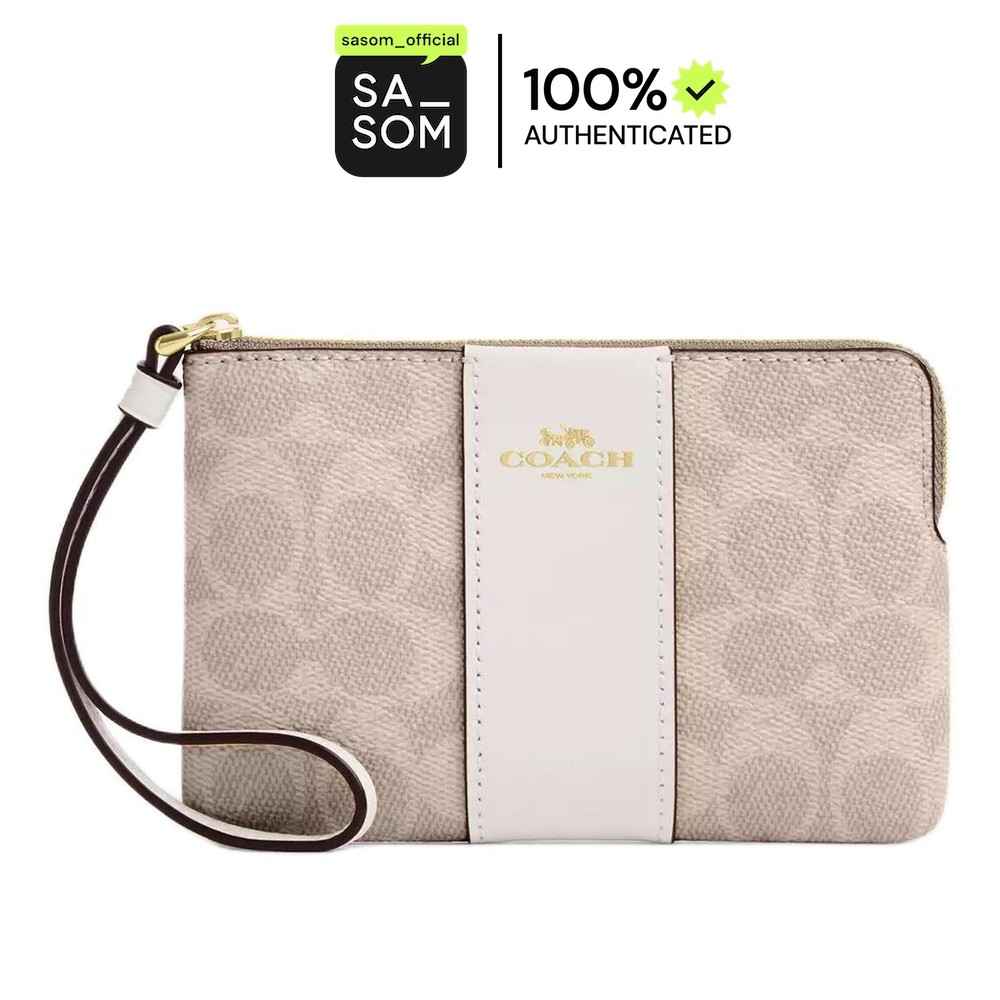 Coach Corner Zip Wristlet In Signature Canvas With Stripe Sand Chalk | ของแท้ ตรวจสอบโดย SASOM