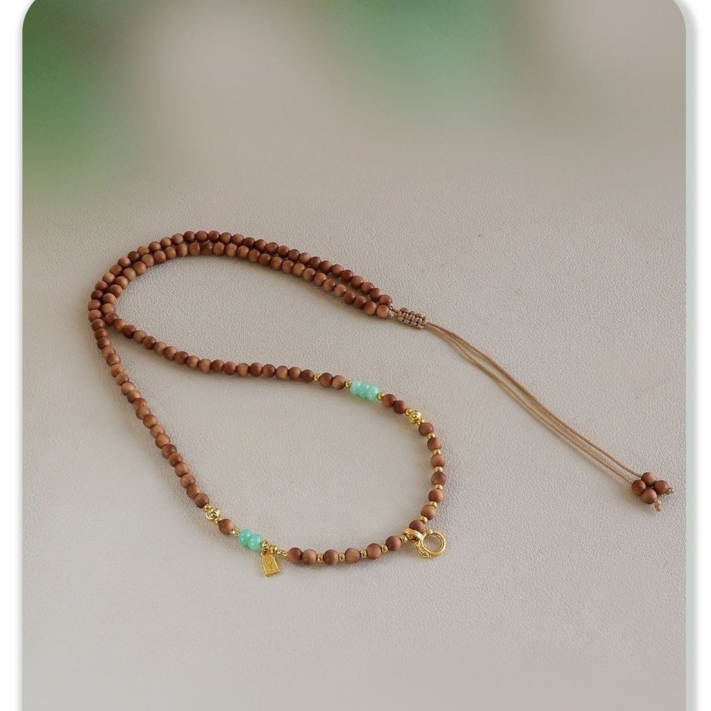 สร้อยคอไม้จันทน์เก่าธรรมชาติของผู้หญิงปรับได้ 天然老山项链女可调万能链子头饰 金Alt061601