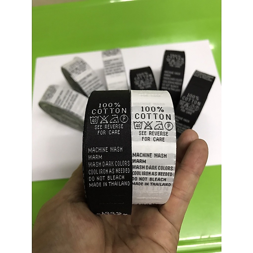 ป้ายทอ ป้ายติดคอเสื้อ 100%cotton พื้นขาว&ดำ ซักแล้วไม่หลุด ขายยกม้วน(300ชิ้น)