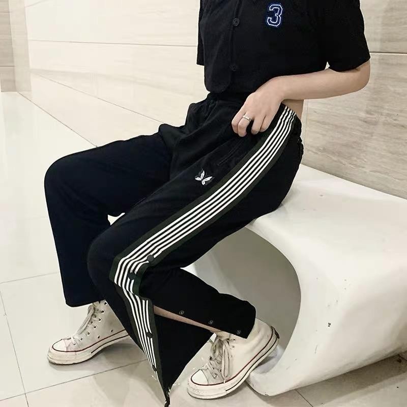 BNAW เล่นอินเทรนด์ NEEDLES Retro ผีเสื้อปักริบบิ้นด้านข้างปุ่มกางเกงผู้ชายผู้หญิงหลวมกางเกงกีฬาลําลอ