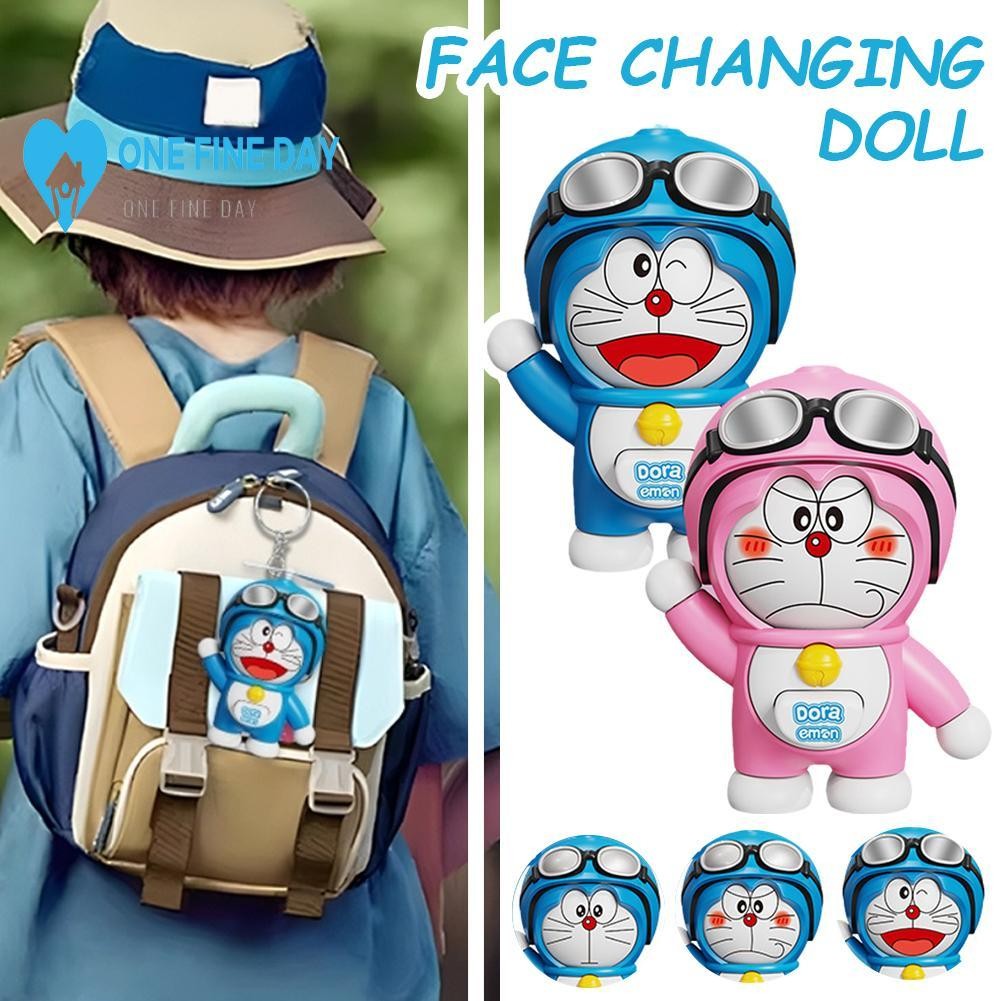 Doraemon Press-to-change Face ของเล่นน่ารักและ Interactive สําหรับเด็กและวัยรุ่นพวงกุญแจและเครื่องปร